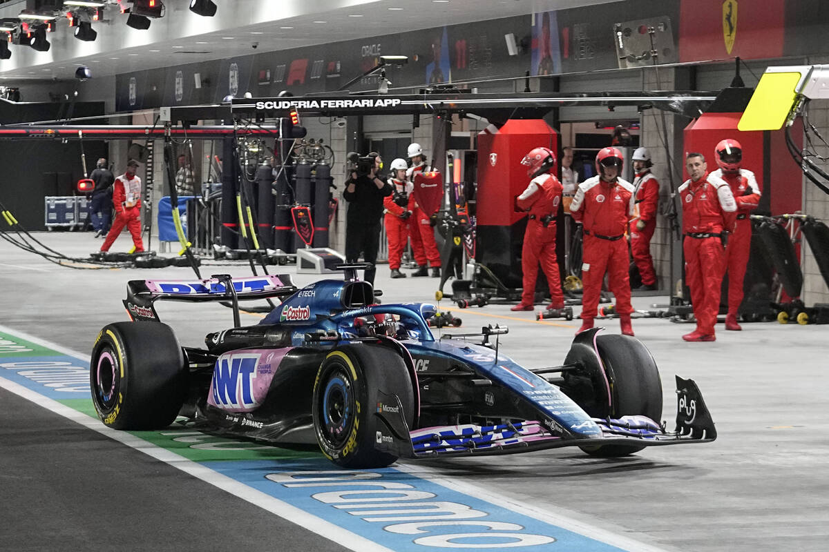Alpine driver Esteban Ocon, of France, comes in for a pit stop during the Formula One Las Vegas ...