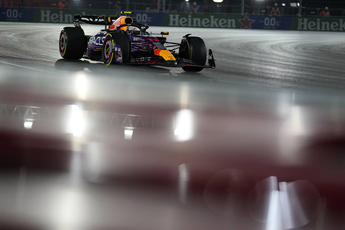 Red Bull driver Sergio Perez, of Mexico, drives during the second practice for the Formula One ...
