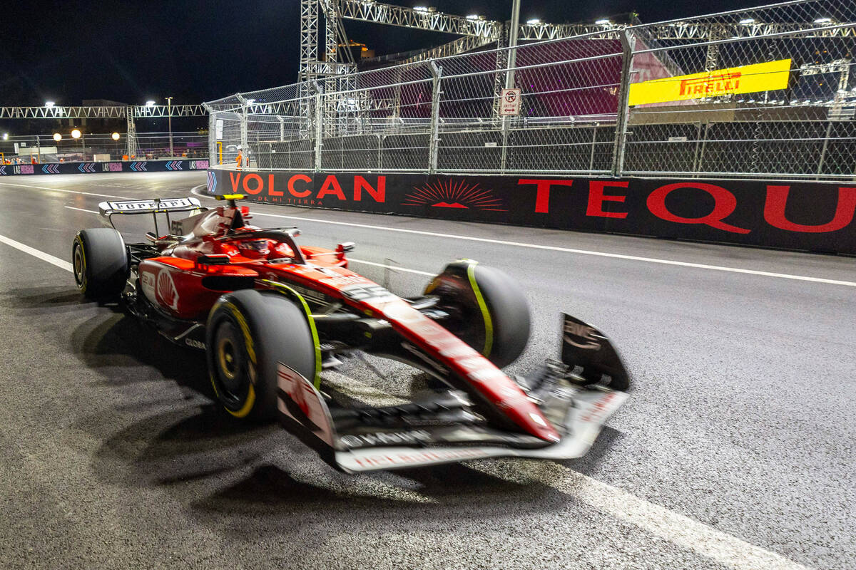 Ferrari driver Carlos Sainz turns the corner around the MSG Sphere during the practice session ...