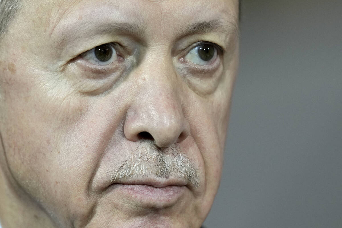 Turkey's President Recep Tayyip Erdogan gives a statement during his visit at the chancellery w ...