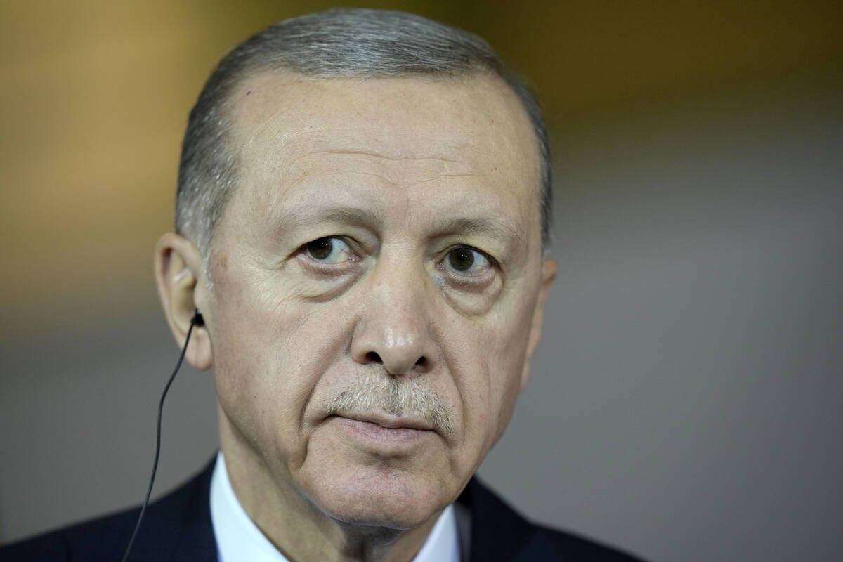 Turkey's President Recep Tayyip Erdogan gives a statement during his visit at the chancellery w ...