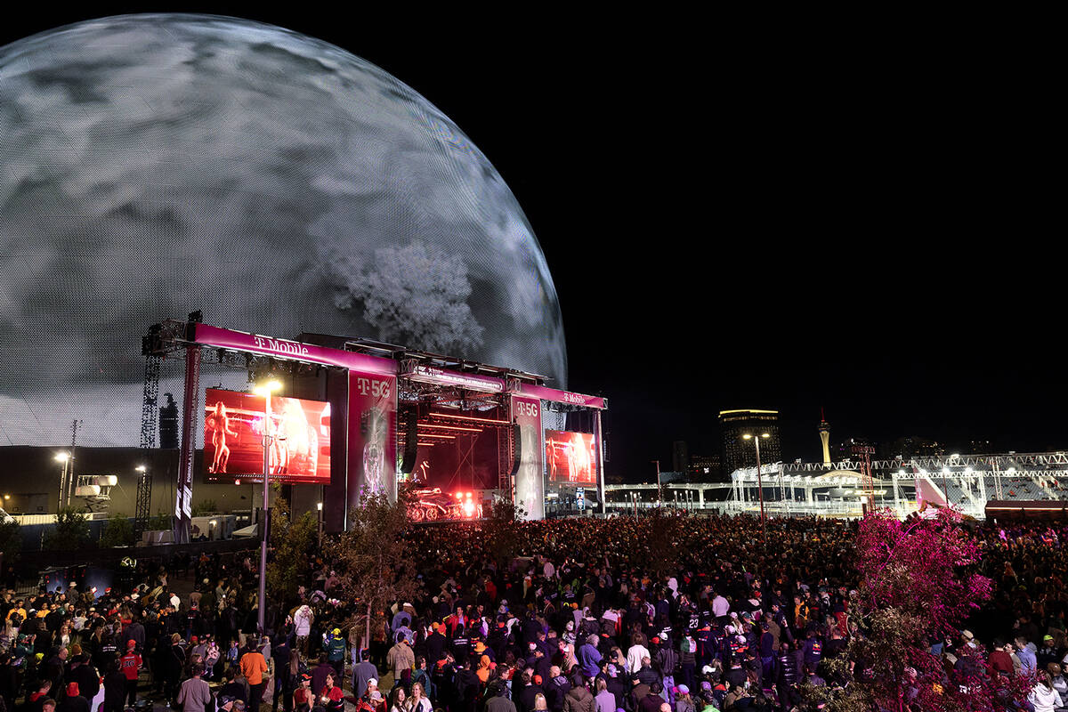 Fans watch J Balvin perform at the Sphere before the Formula One Las Vegas Grand Prix auto race ...