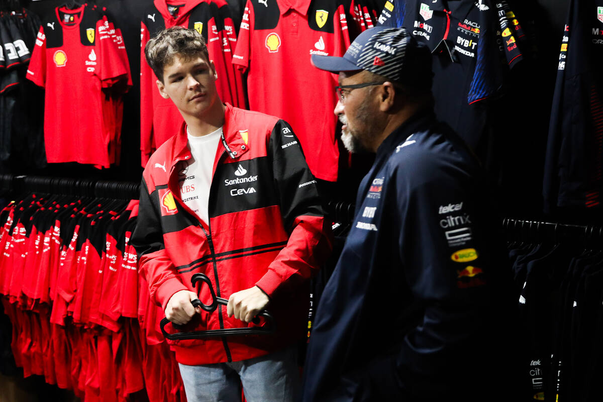 Formula 1 fans shop at a V12 Trackside International Motorsports Store prior to the final Formu ...