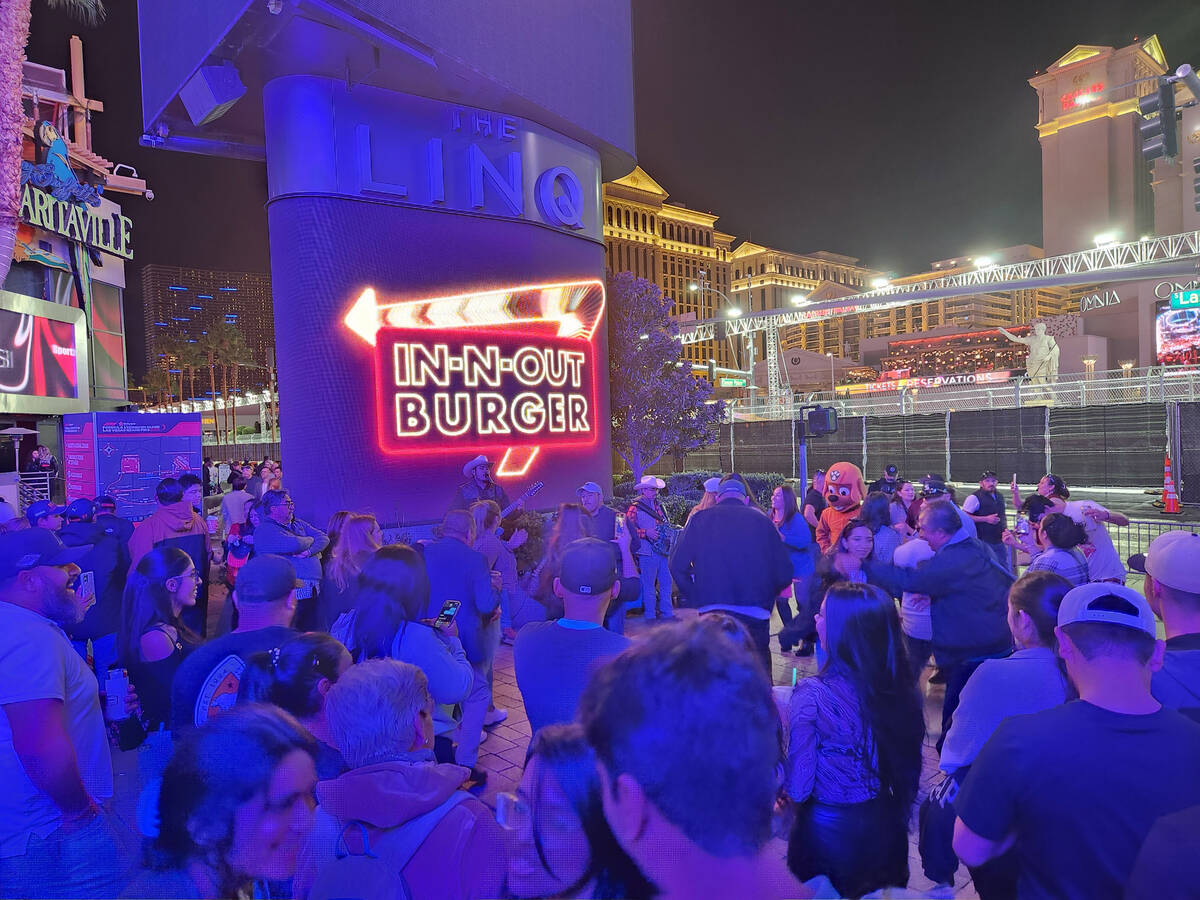 An impromptu dance floor opened up right in front of the entrance to the Linq Promenade on Satu ...