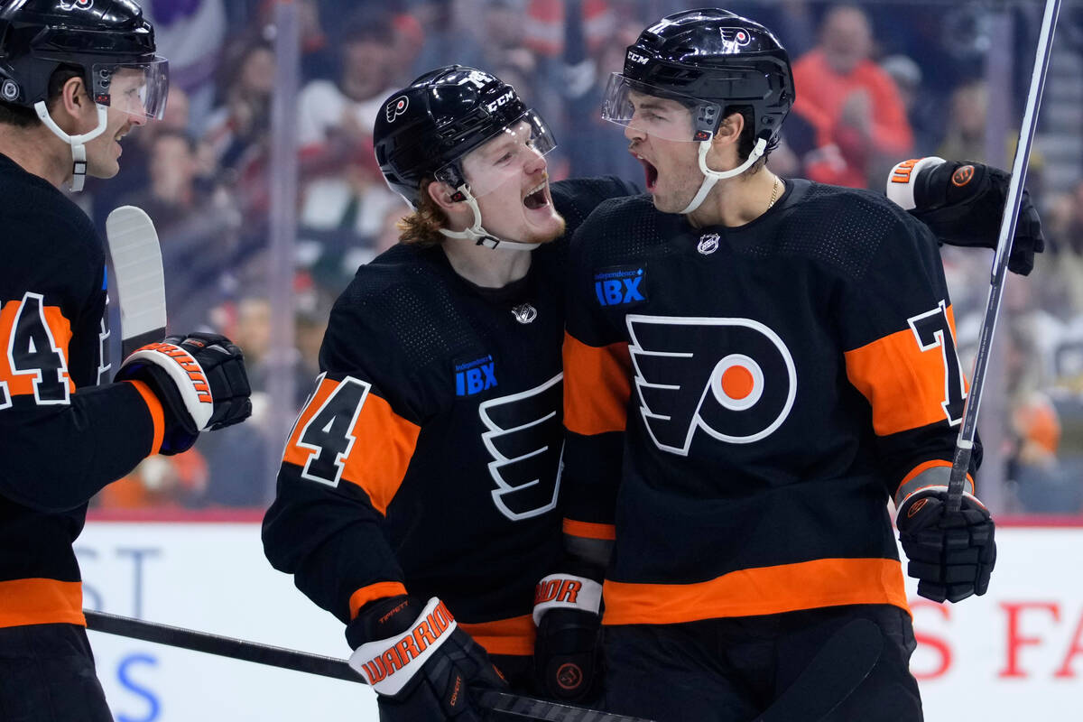 Philadelphia Flyers' Tyson Foerster, from right, Owen Tippett and Sean Couturier celebrate afte ...
