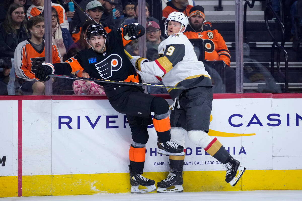 Philadelphia Flyers' Ryan Poehling, left, and Vegas Golden Knights' Jack Eichel collide during ...