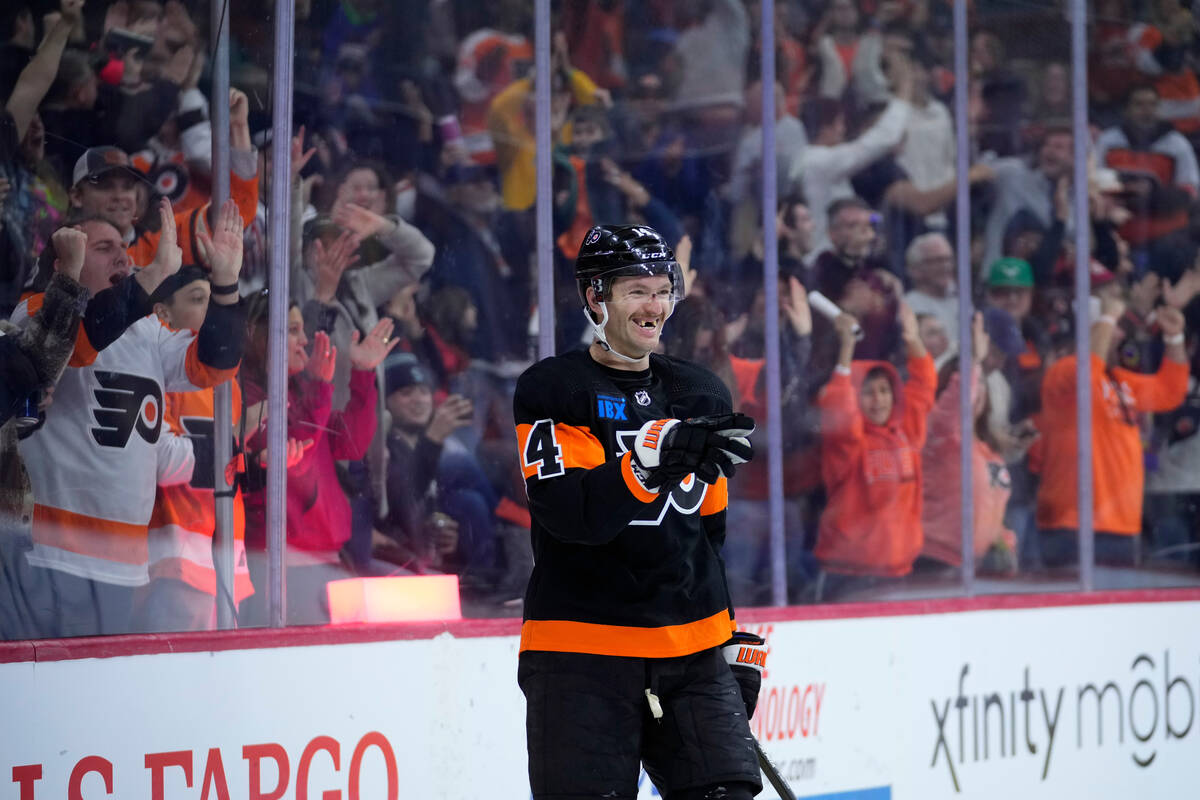 Philadelphia Flyers' Sean Couturier reacts after scoring the game-winning goal during overtime ...