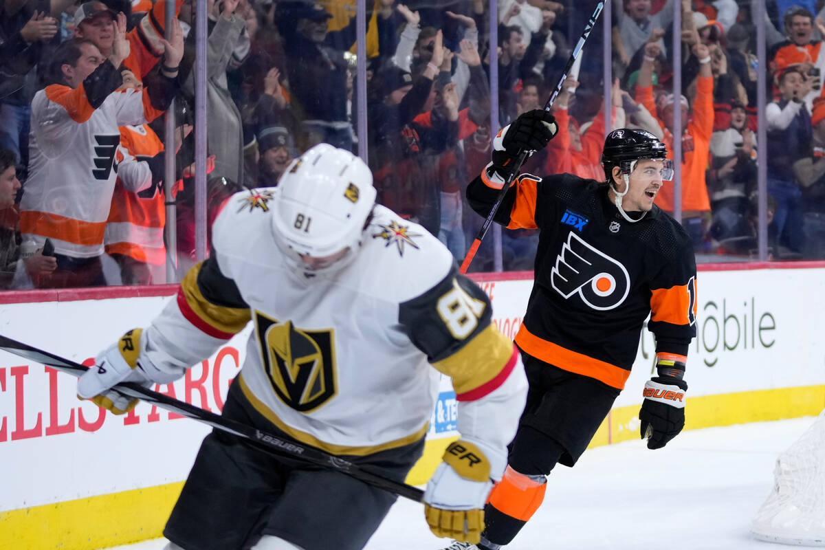 Philadelphia Flyers' Travis Konecny, right, reacts past Vegas Golden Knights' Jonathan Marchess ...