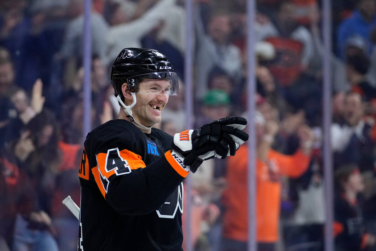 Philadelphia Flyers' Sean Couturier reacts after scoring the game-winning goal during overtime ...