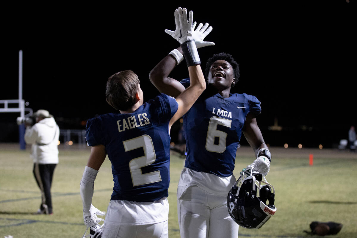 Lake Mead wide receiver Jaylen Hardy (6) celebrates his touchdown with wide receiver Tyler Broo ...