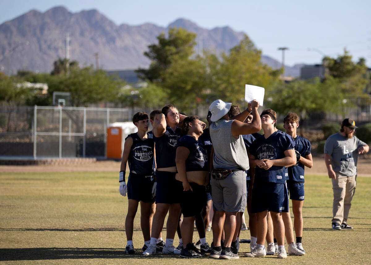 Lake Mead’s defense checks out a play during football practice at Lake Mead Christian Ac ...