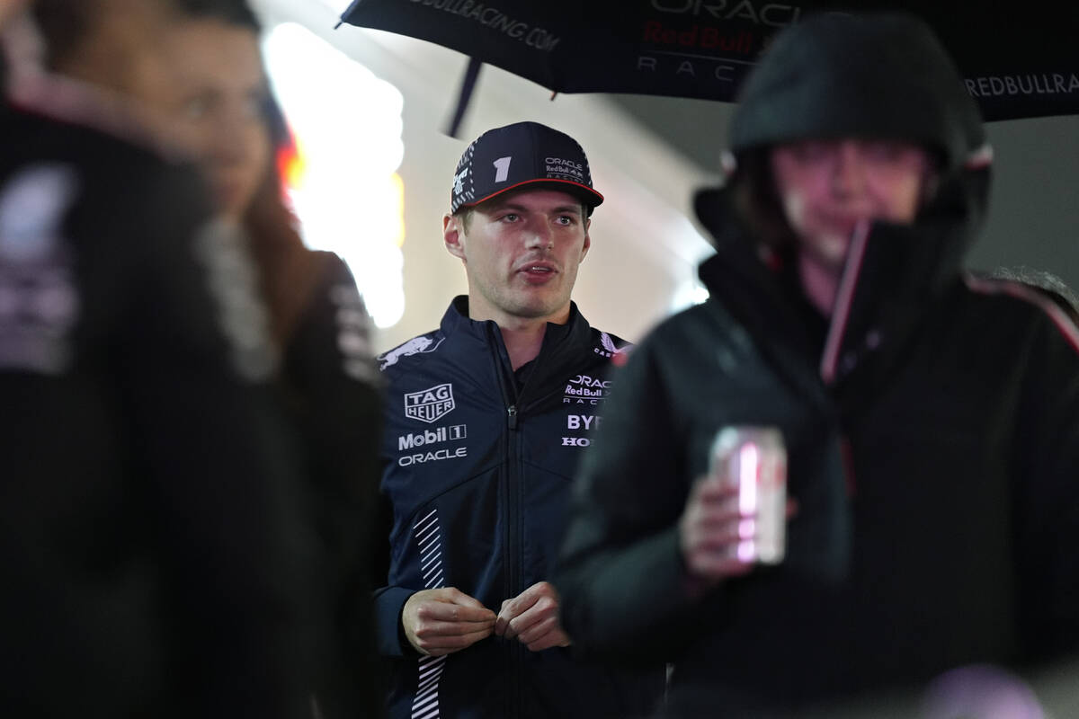 Red Bull driver Max Verstappen, of the Netherlands, heads to a media interview ahead of the For ...