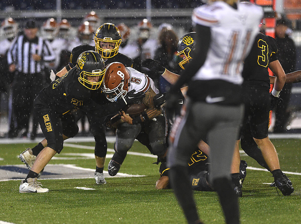 Legacy’s Phoenix Jennings fights for extra yards while taking on Galena during their Class 5A ...