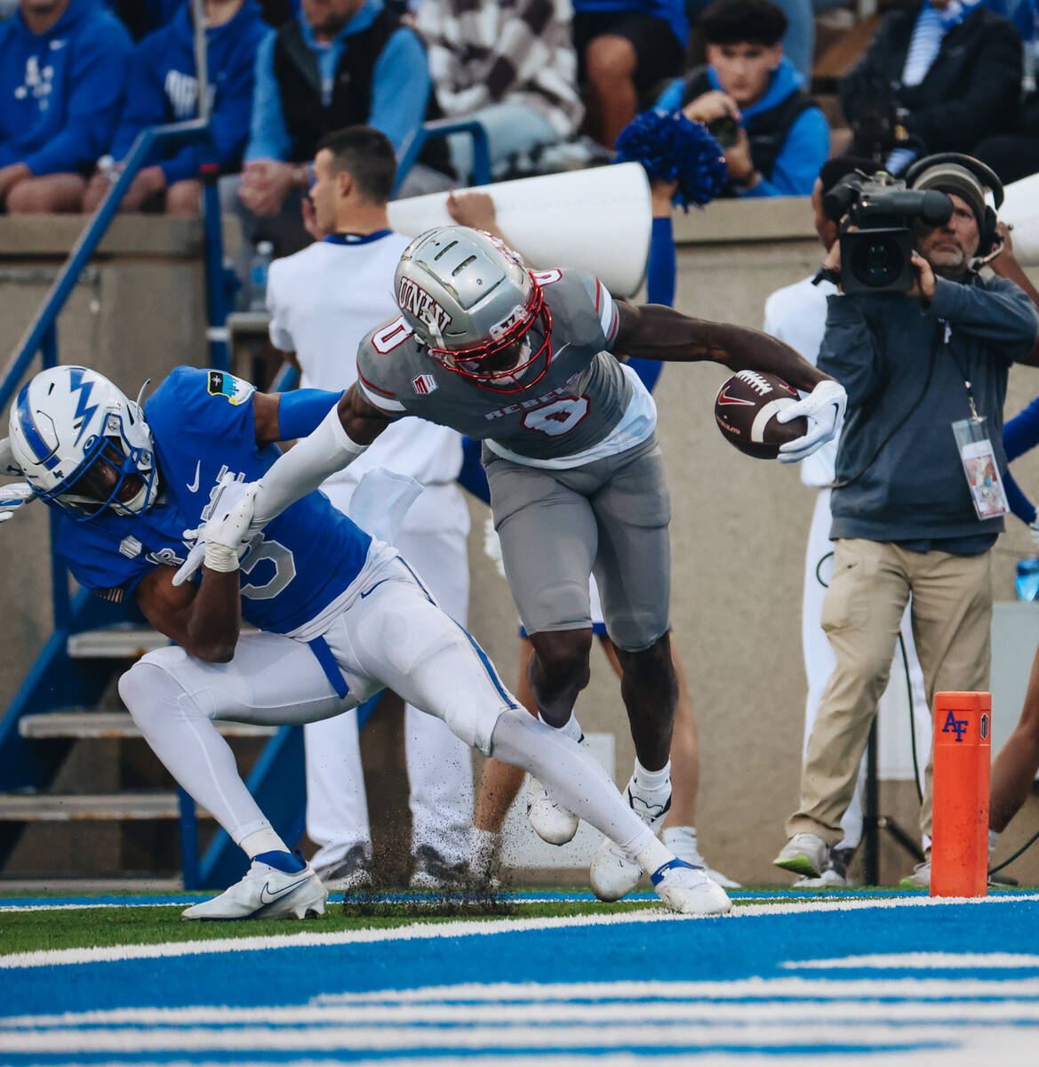 UNLV wide receiver Zyell Griffin (3) fights against Air Force defensive back Jamari Bellamy (3) ...