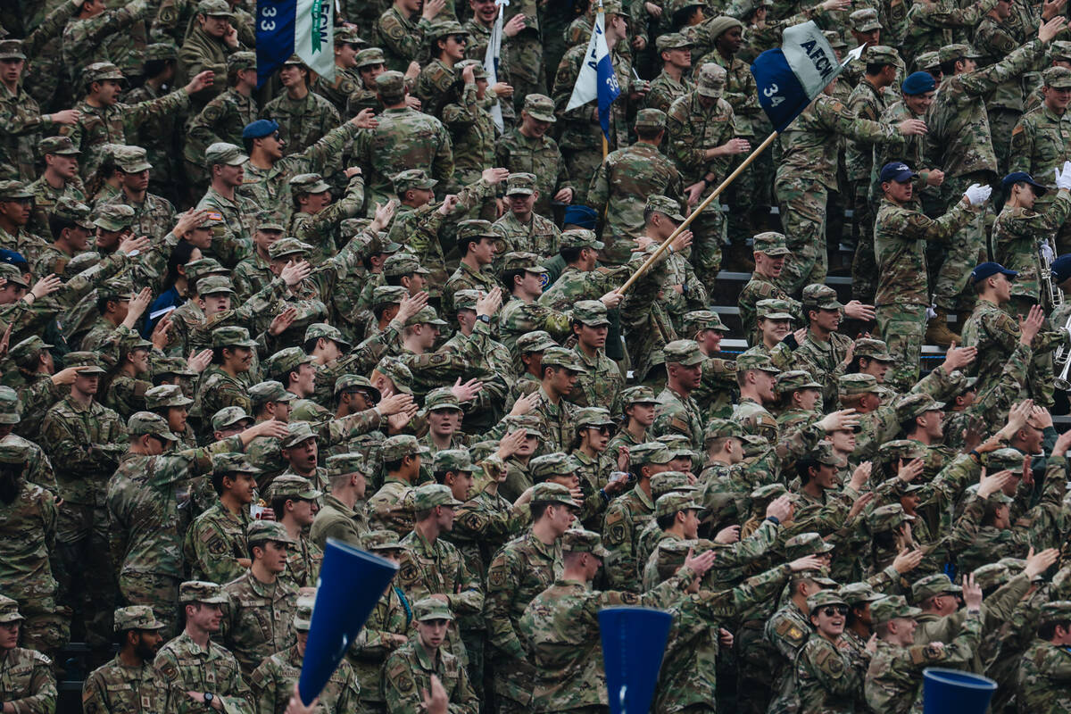 Air Force cadets cheer for their team from the student section during a game against UNLV at Fa ...