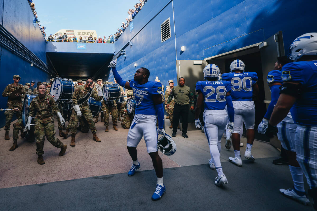 The Air Force marching band hypes up Air Force football players before a game against UNLV at F ...