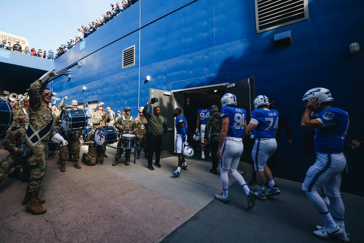 The Air Force marching band hypes up Air Force football players before a game against UNLV at F ...