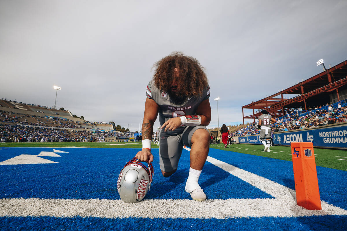 UNLV defensive lineman Naki Fahina (6) prays n the end zone before a game against Air Force at ...