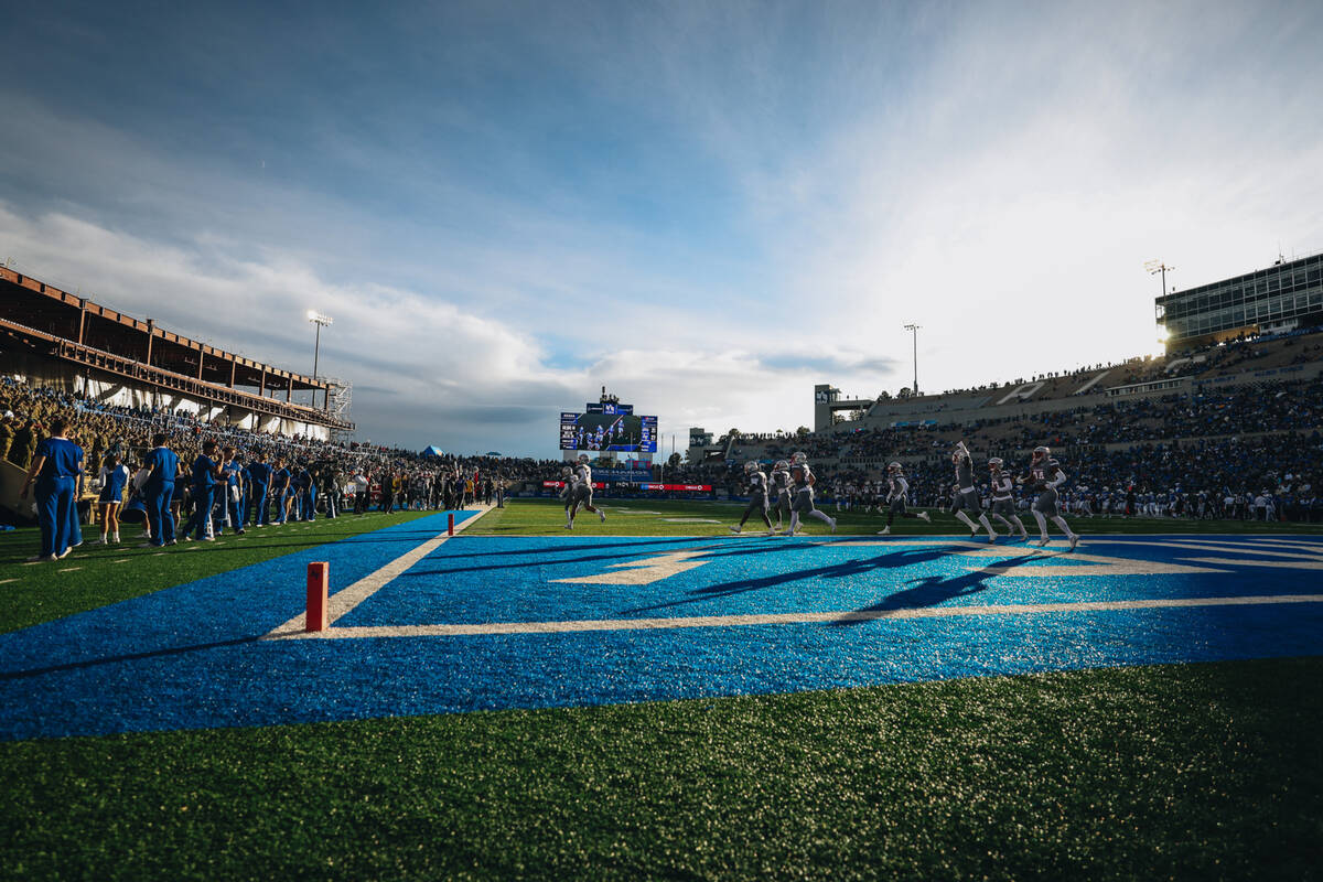 UNLV players run to their bench during a game against Air Force at Falcon Stadium on Saturday, ...