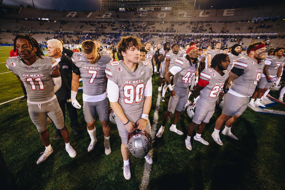 UNLV players listen to the Air Force band after a game against Air Force at Falcon Stadium on S ...