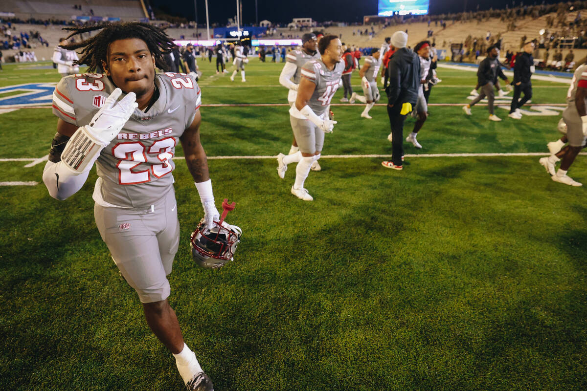 UNLV defensive back Quentin Moten (23) runs off the field celebrating a win over Air Force at F ...