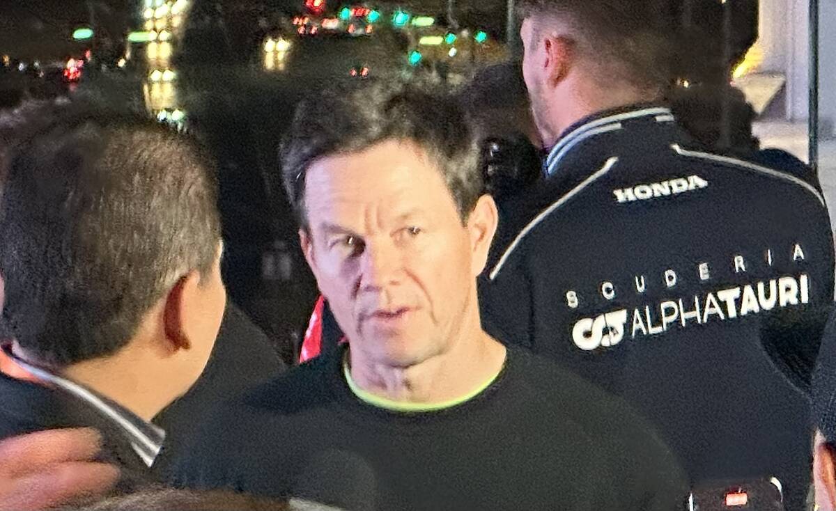 A-list actor Mark Wahlberg is shown at the McLaren Vista F1 viewing party on the VIP pool deck ...