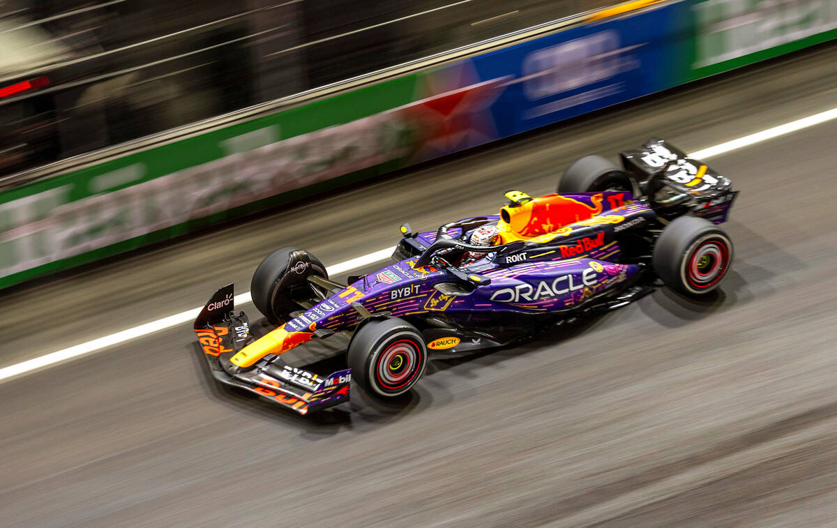 Red Bull Racing driver Sergio Perez speeds down the front straightaway during the Las Vegas Gra ...