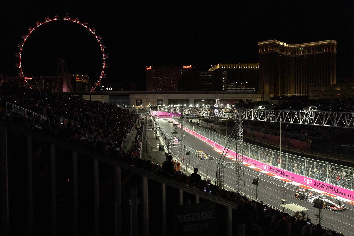 A line of drivers passes by the Sphere during the Formula One Las Vegas Grand Prix auto race on ...