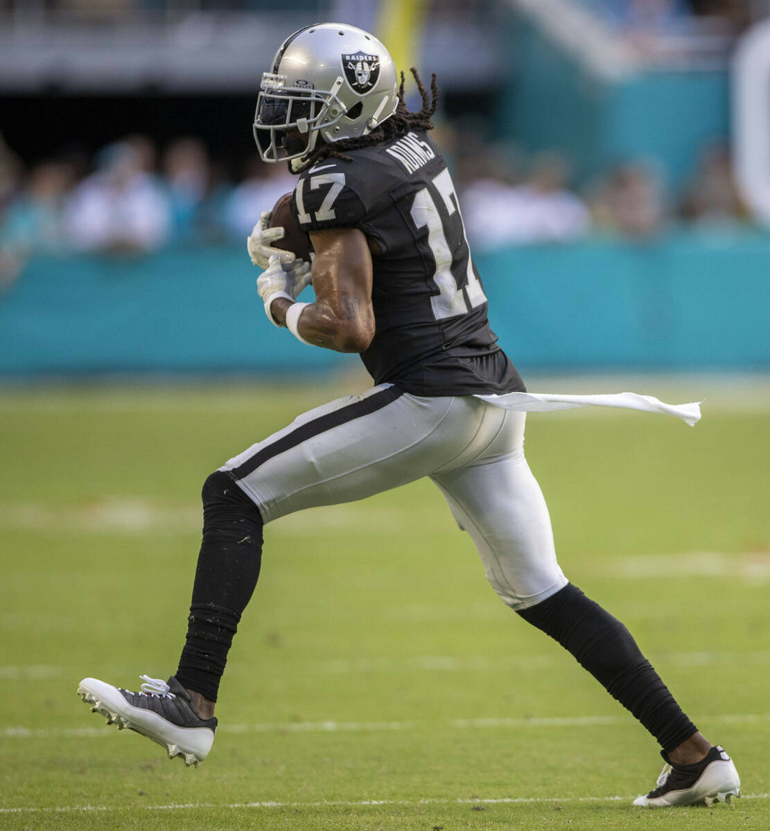 Raiders wide receiver Davante Adams (17) makes a catch against the Miami Dolphins during the se ...