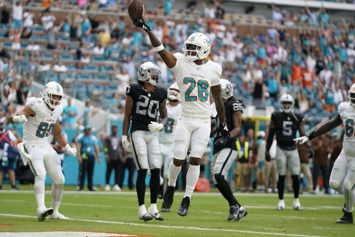 Miami Dolphins running back Salvon Ahmed (26) celebrates after scoring a touchdown during the f ...