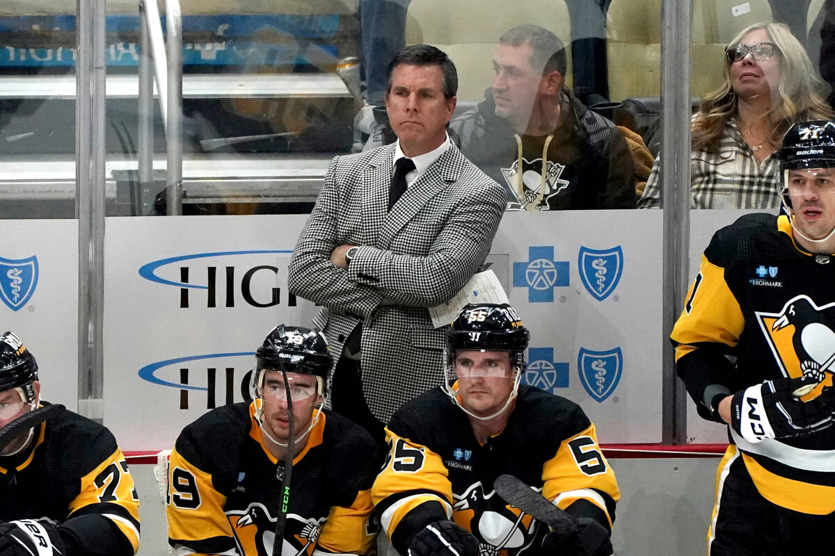 Pittsburgh Penguins head coach Mike Sullivan stands behind the bench during the third period of ...