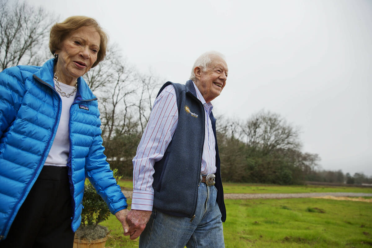 In this Feb. 8, 2017, file photo former President Jimmy Carter, right, and his wife Rosalynn ar ...