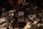 A damaged clock outside a home that came under attack during a massive Hamas invasion into Kibb ...