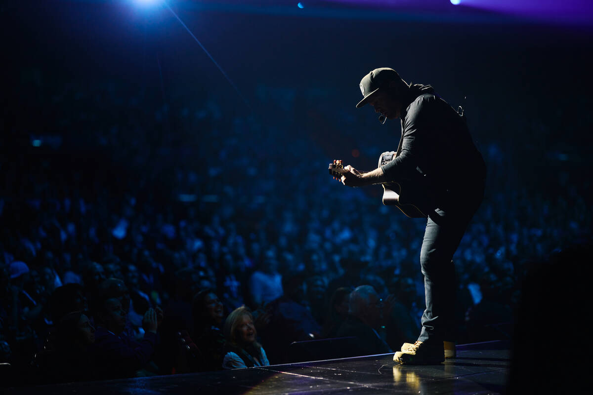 Garth Brooks is shown in his "Garth Brooks/Plus One" opener at the Colosseum at Caesars Palace ...