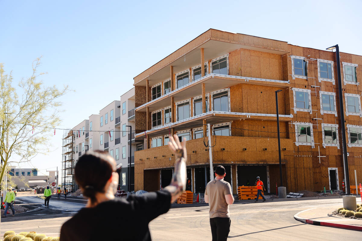 Amalie Zinsser, community director for Uncommons, shows apartments under construction during a ...