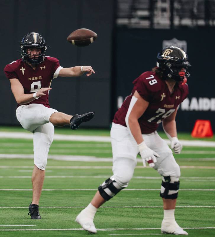 Faith Lutheran kicker Caden Chittenden (9) kicks the ball during a class 5A Division II state c ...