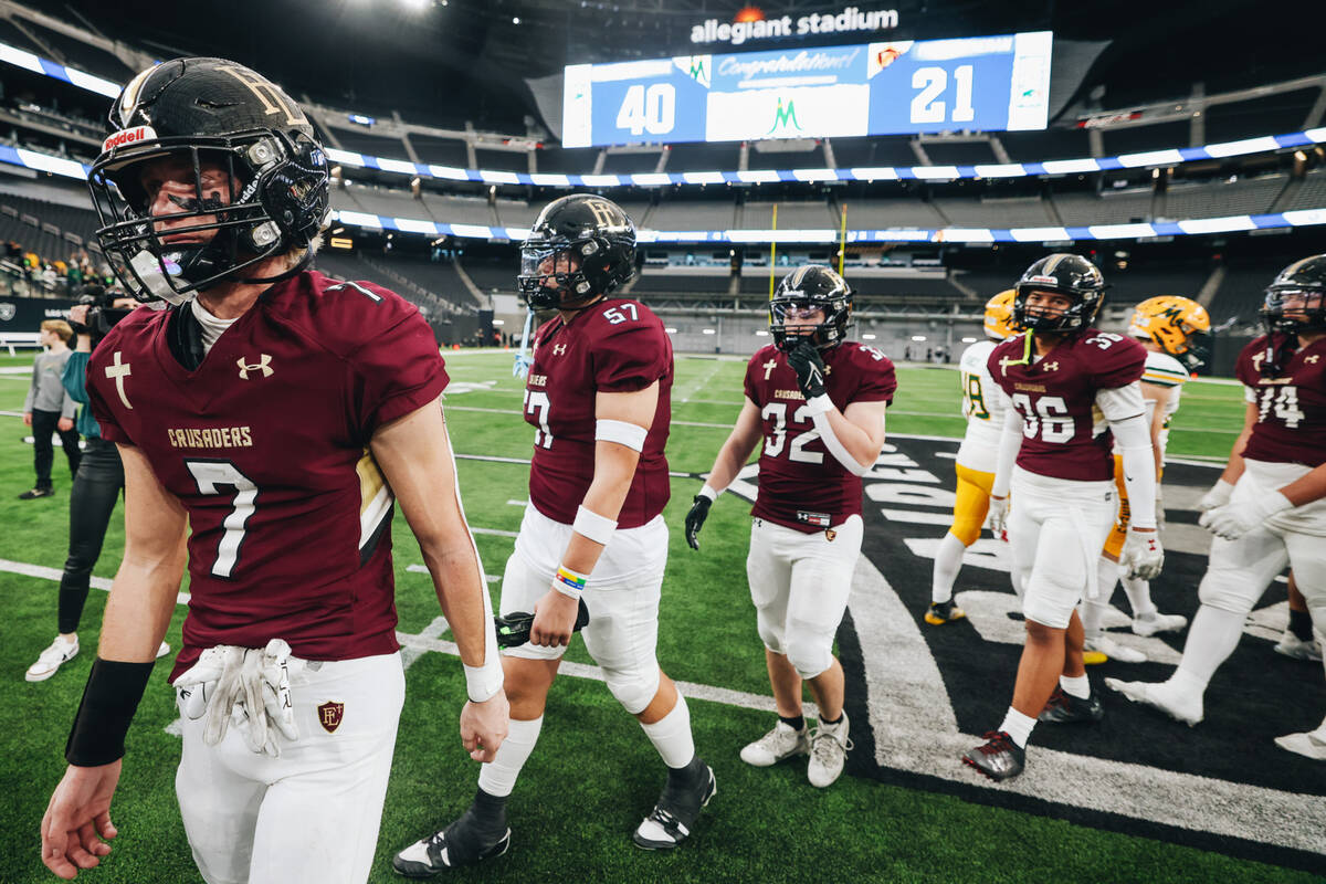 Faith Lutheran wide receiver Mason Aday (7) gets emotional as he walks off the field after losi ...