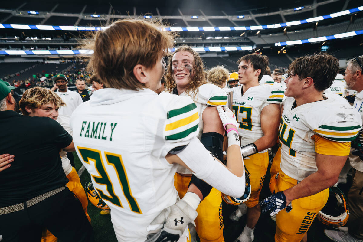 Bishop Manogue celebrates after winning a class 5A Division II state championship game against ...