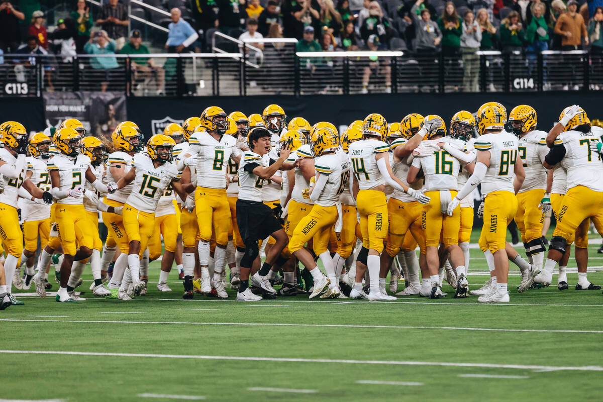 Bishop Manogue celebrates their win over Faith Lutheran during a class 5A Division II state cha ...