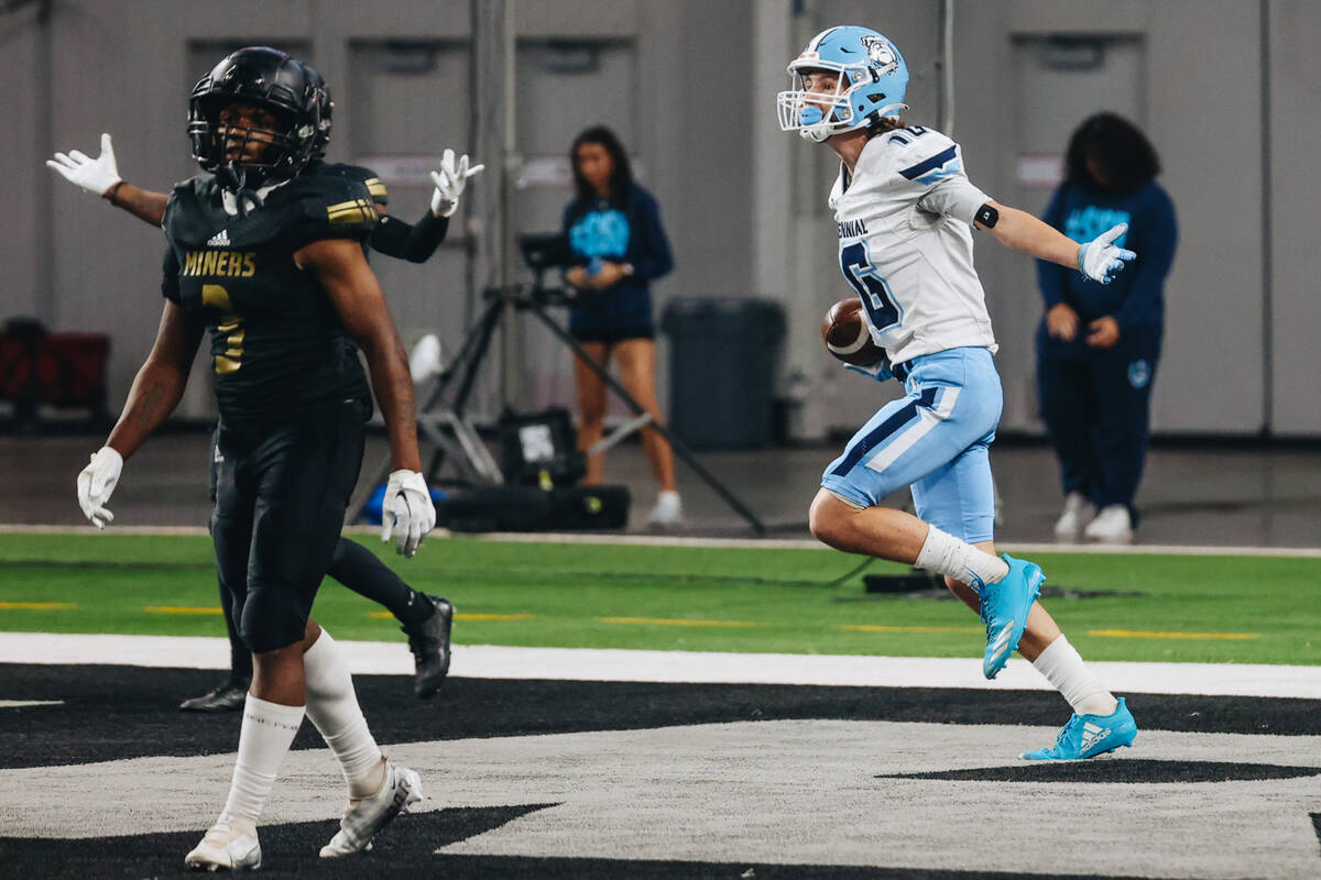 Centennial wide receiver Logan Weimer (16) celebrates a touchdown during a class 4A state champ ...