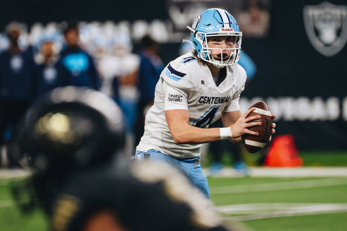 Centennial quarterback Vic Plotnikov (4) looks to pass the ball during a class 4A state champio ...