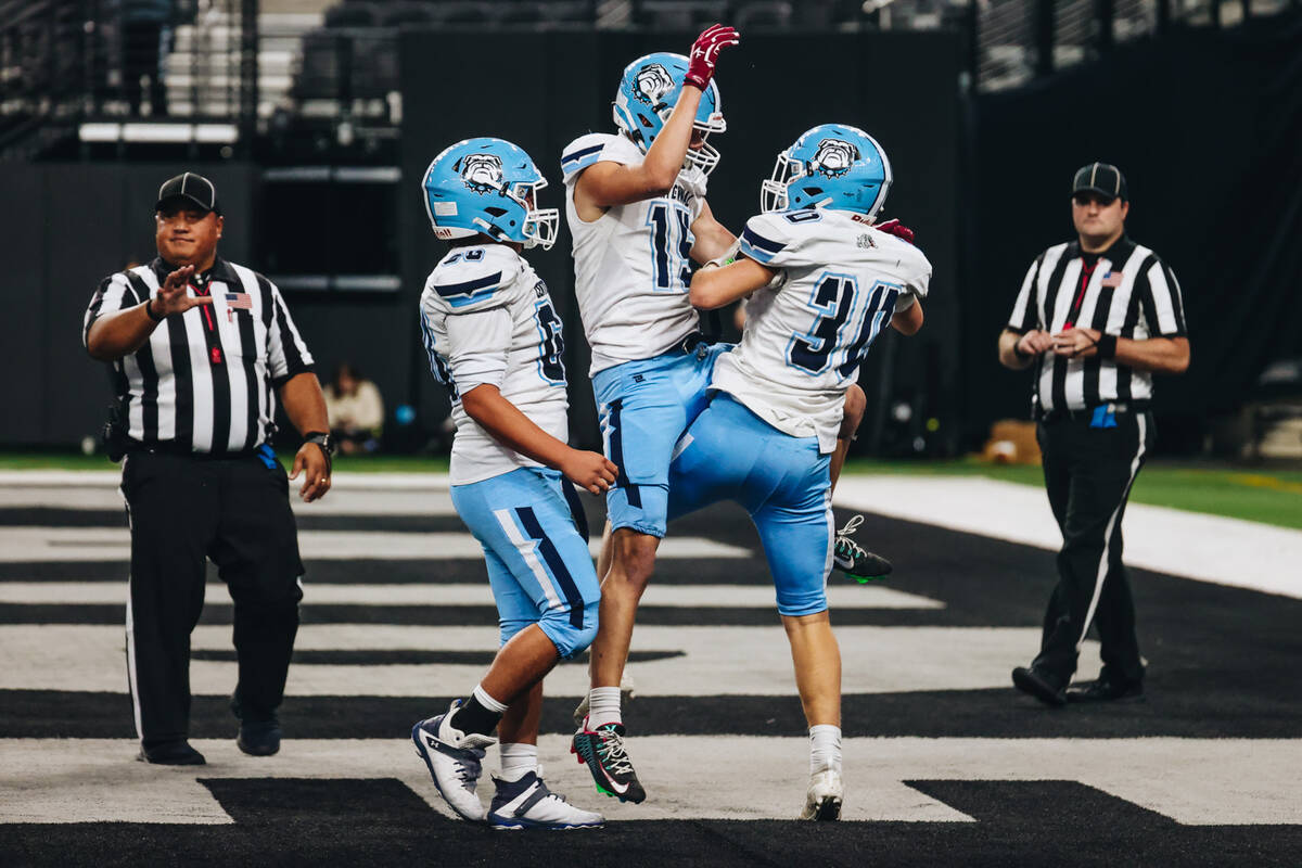 Centennial players celebrate a touchdown during a class 4A state championship game against Sunr ...