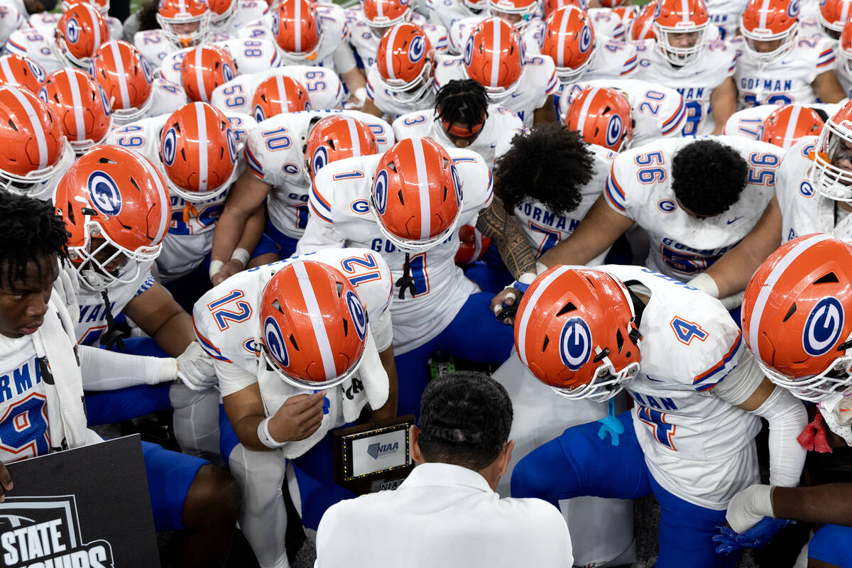 Bishop Gorman prays after winning the Class 5A Division I high school football state championsh ...