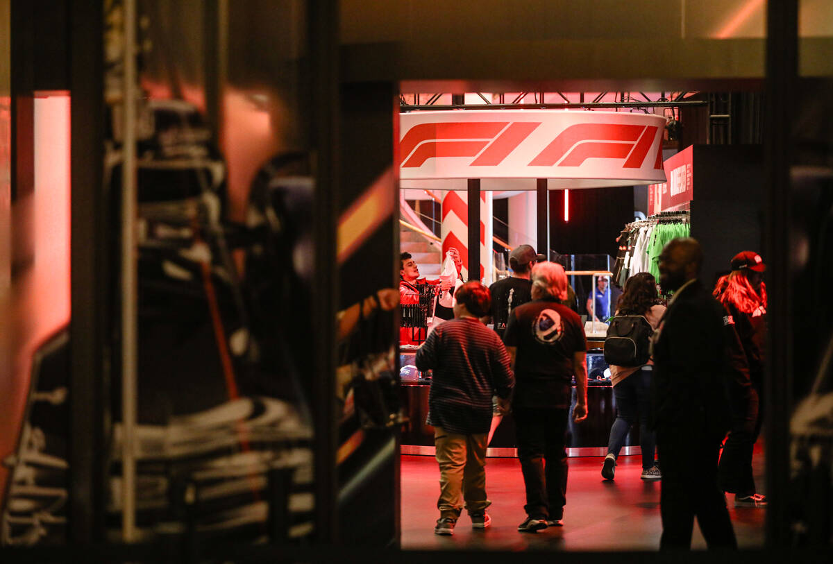 A pop-up retail outlet for Las Vegas Grand Prix merchandise near the waterfall atrium between T ...