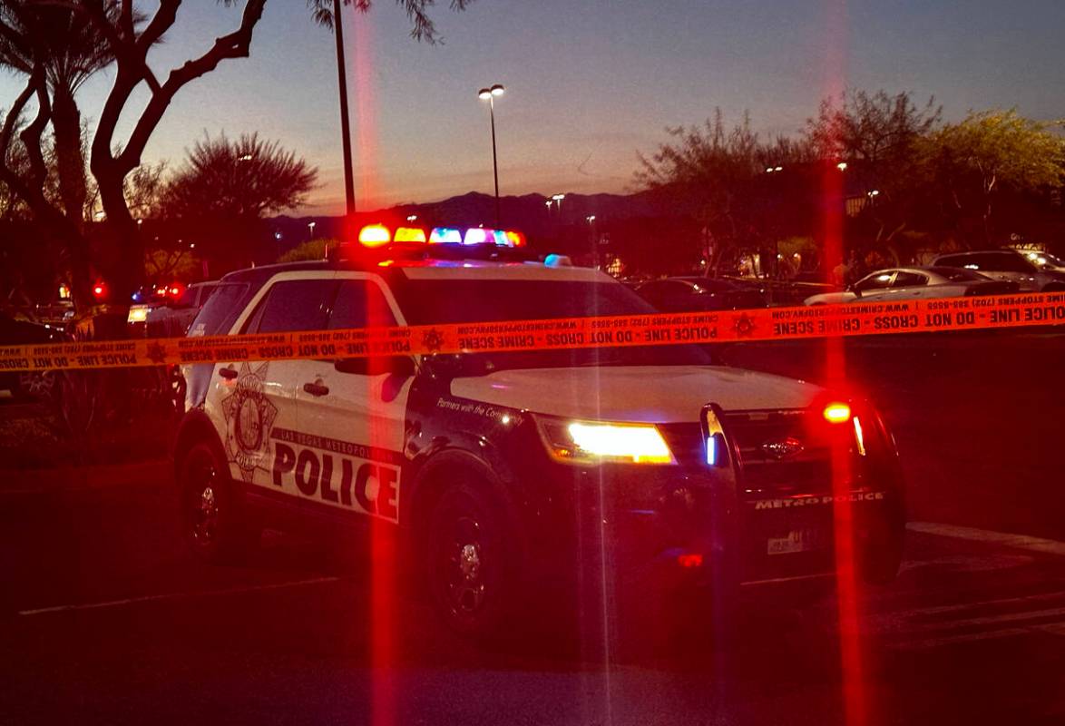 Police investigate a fatal shooting scene near Walmart at 7200 block of Arroyo Crossing Parkway ...