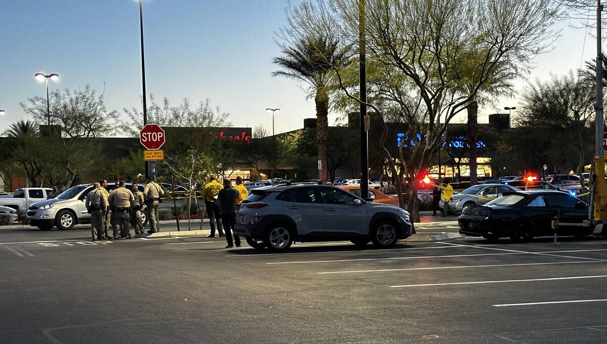 Police investigate a fatal shooting scene near Walmart at 7200 block of Arroyo Crossing Parkway ...