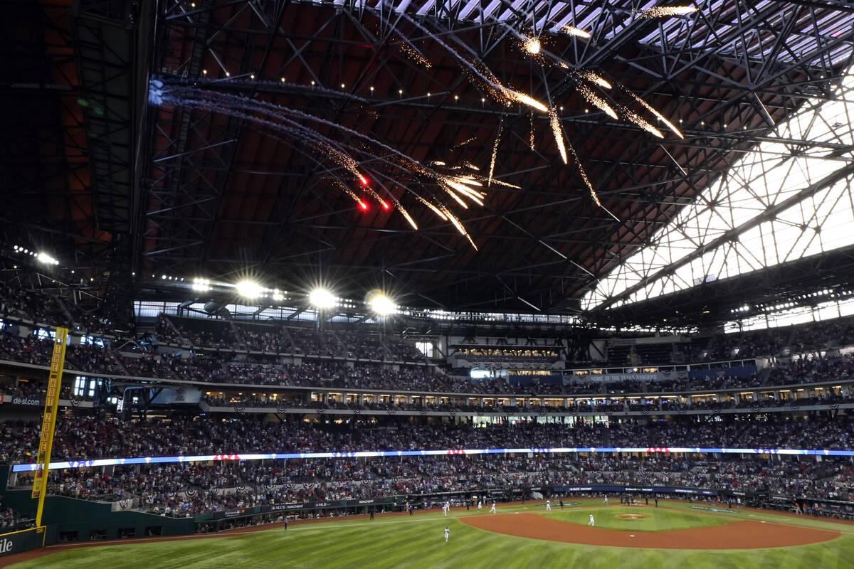 Fireworks fly over Globe Life Field for the start of Game 5 of the baseball American League Cha ...