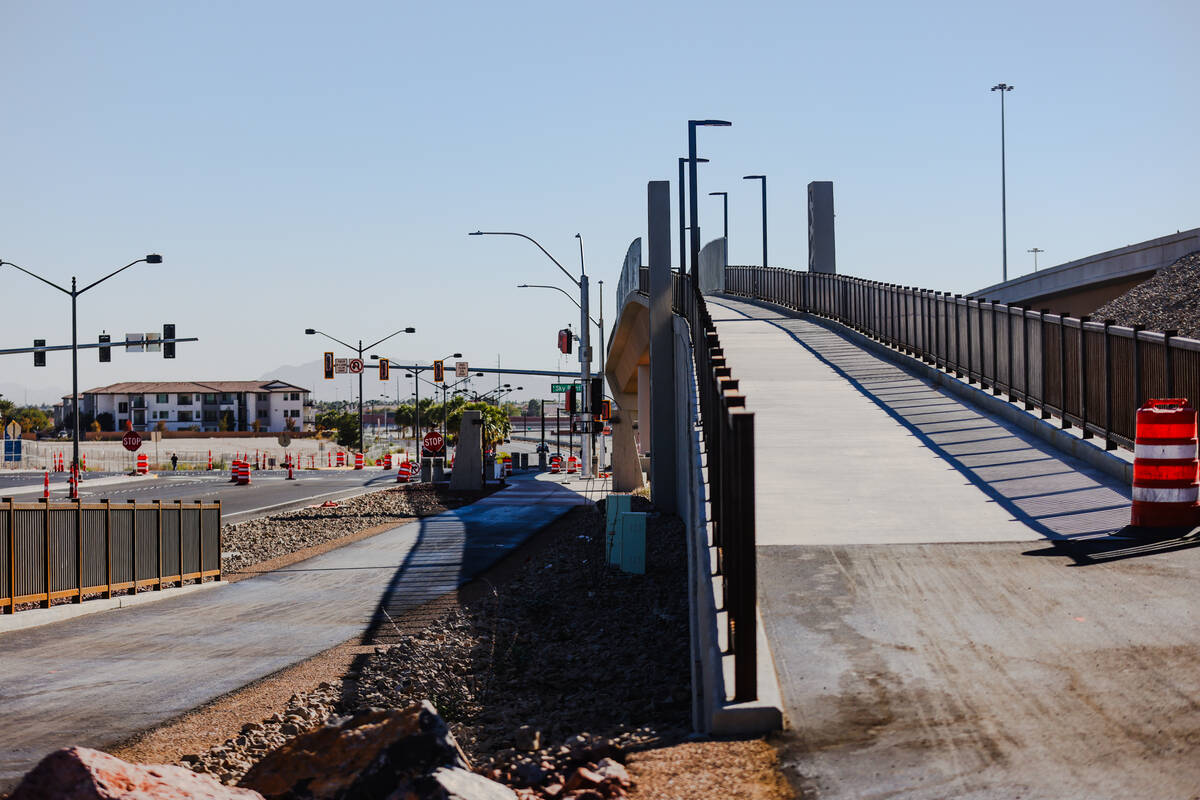 The multi-use trail and bridge near Centennial Parkway, newly created as part of the Centennial ...