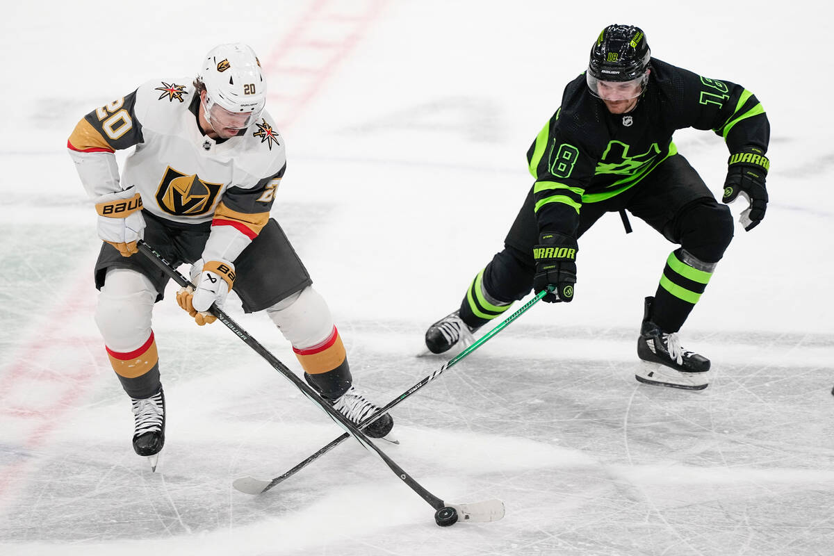 Vegas Golden Knights center Chandler Stephenson (20) skates with the puck against Dallas Stars ...