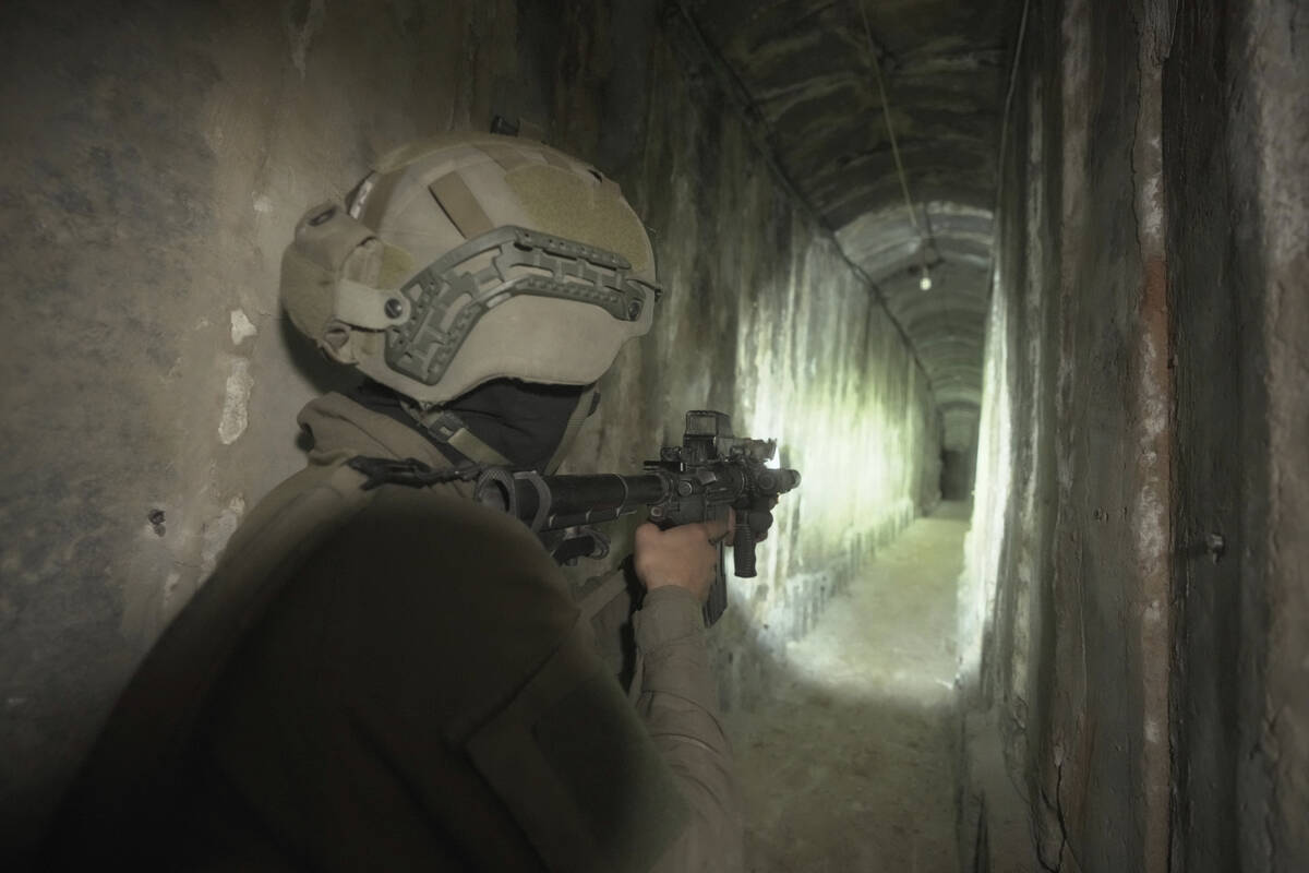 Israeli soldiers show the media an underground tunnel found underneath Shifa Hospital in Gaza C ...